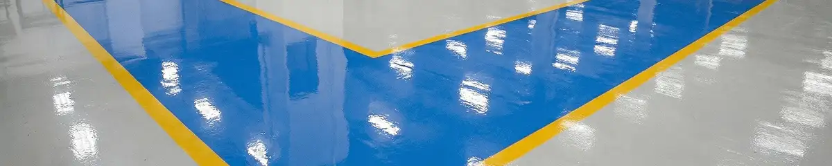A factory floor professionally covered and marked with epoxy flooring in Kansas City, MO