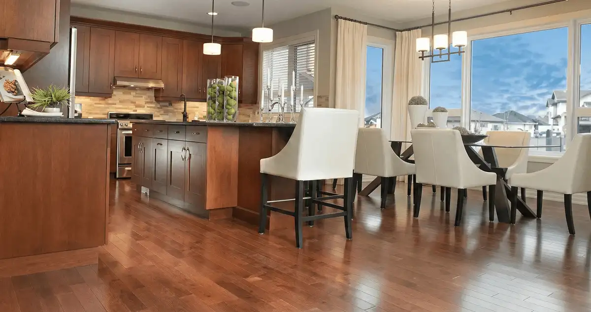 A modern kitchen with professionally installed wood flooring in Kansas City, MO